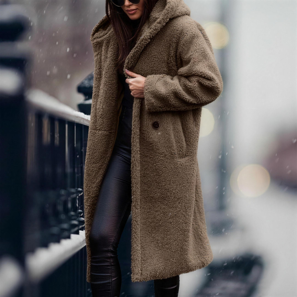 Manteau teddy long ajusté sur silhouette élégante
