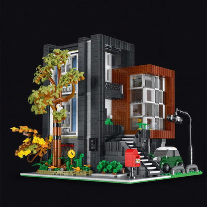 Villa moderne en briques de construction, emballage et contenu de la boîte