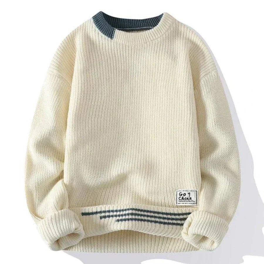 pull homme coupe loose avec poignets côtelés, vue de profil