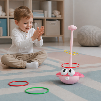 Enfant jouant au lancer d'anneaux avec le set de jeu actif 3-en-1 rose
