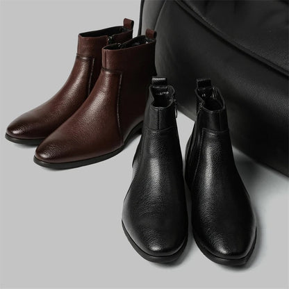 bottes en cuir noires, avec un sachet de protection
