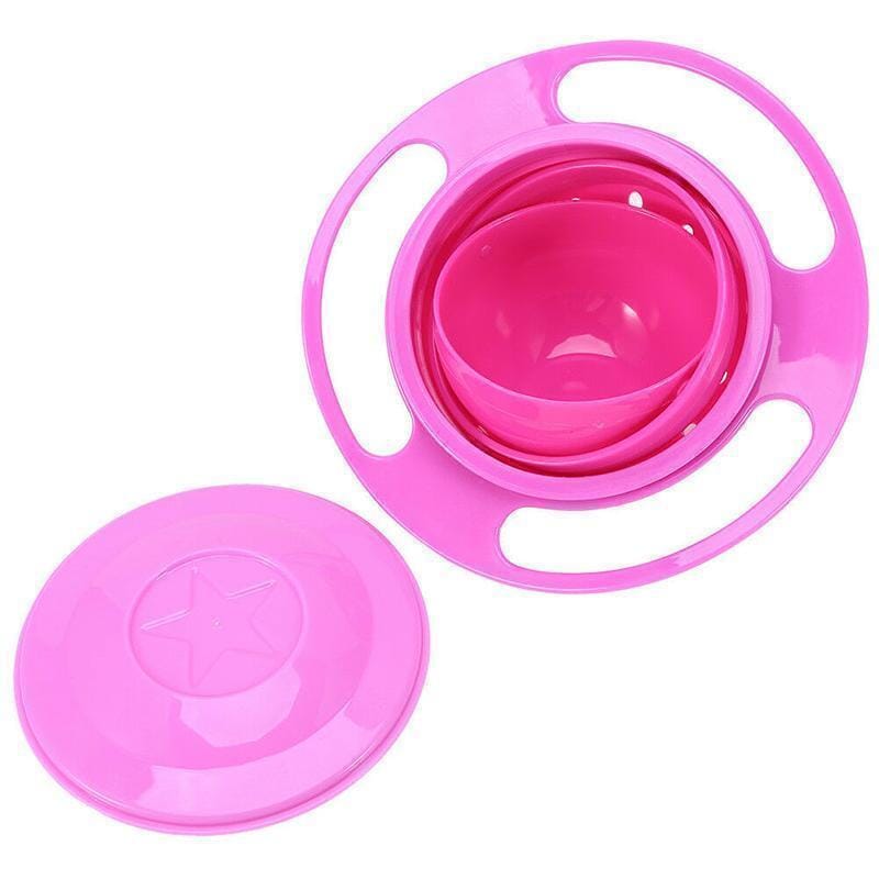 Enfant utilisant le bol gyroscopique au moment du goûter