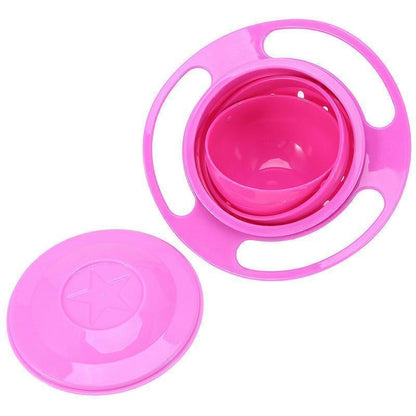 Enfant utilisant le bol gyroscopique au moment du goûter