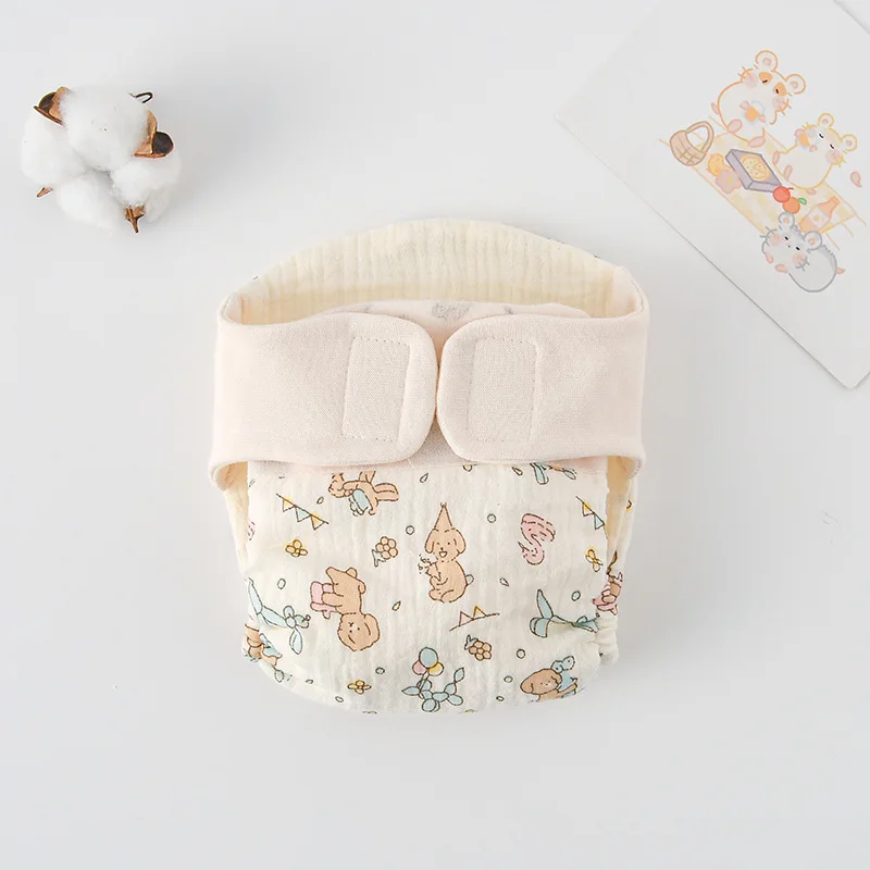 Détail de la fermeture par boutons-pression du body bébé