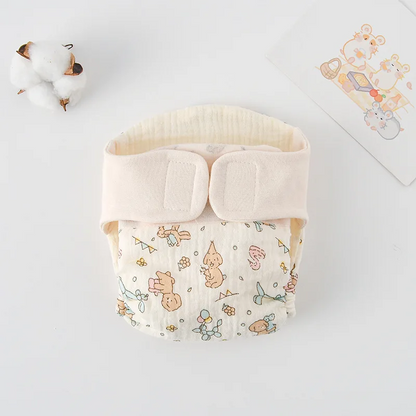 Détail de la fermeture par boutons-pression du body bébé