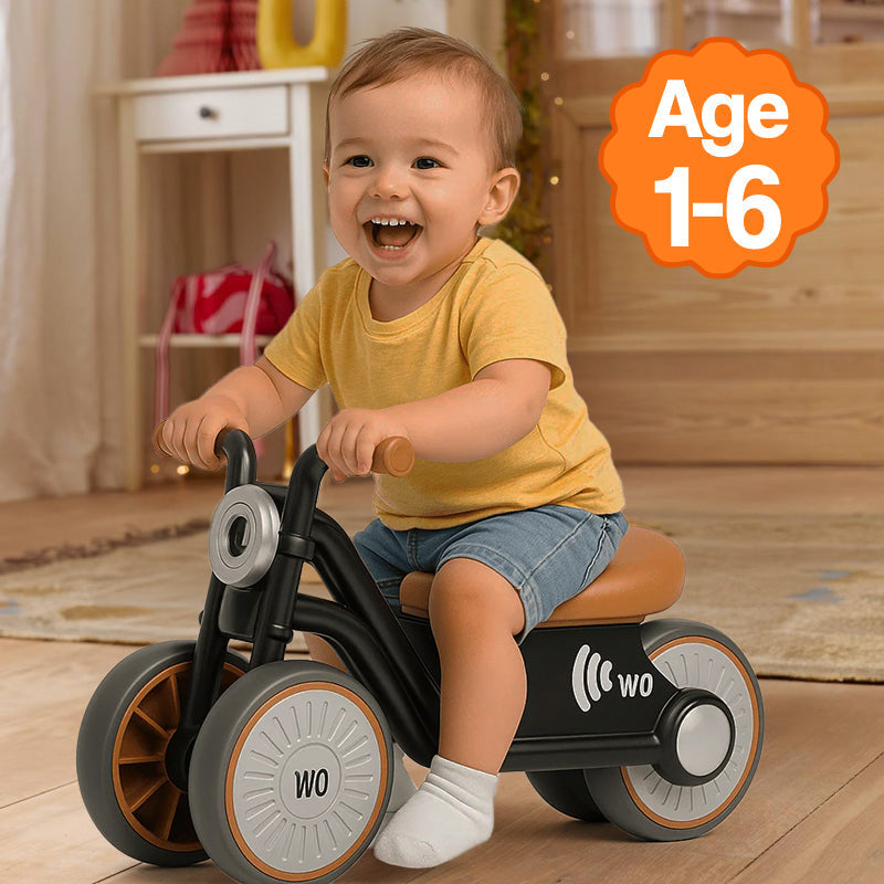 Jeune enfant roulant en intérieur sur la draisienne moto, adaptée de 1 à 6 ans