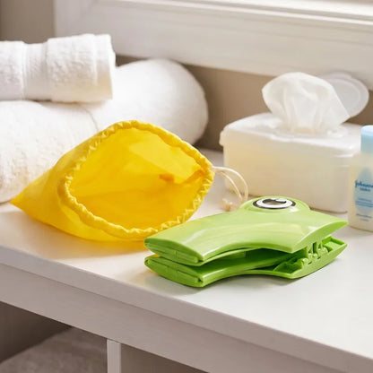 Réducteur de toilette grenouille installé sur les toilettes