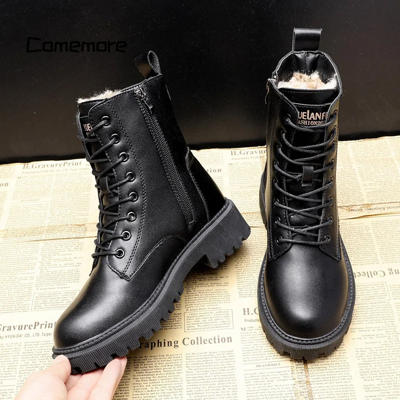 Bottes d'hiver en cuir noir femme, détail semelle et fermeture zip