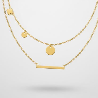 Collier chaînes superposées doré, détail des breloques