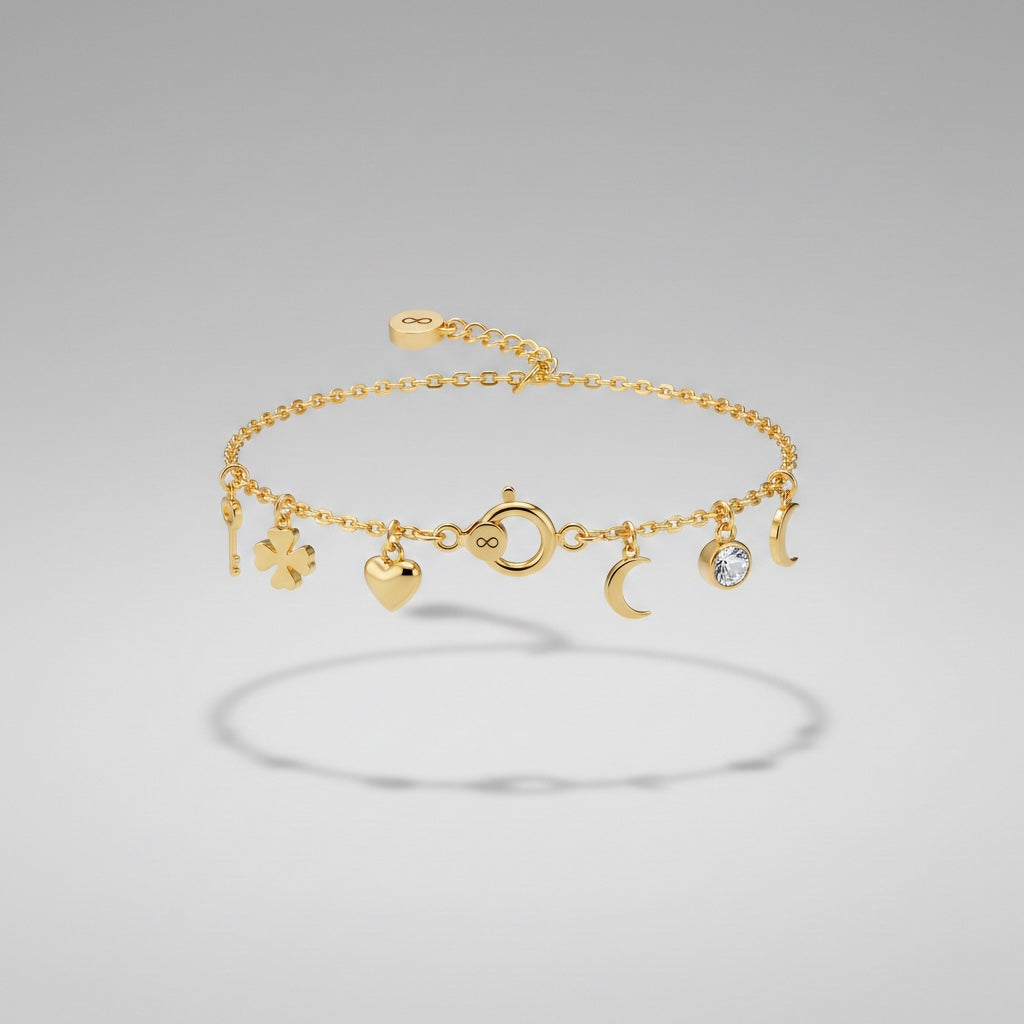 Pulsera con dijes de oro