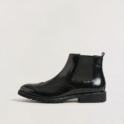 Bottines Chelsea brogue noires, vue de face