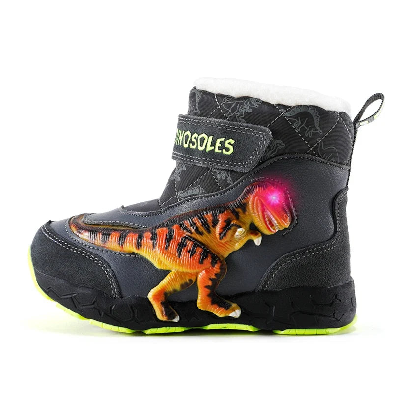 Bottes de neige enfant lumineuses LED grises motif dinosaure, vue studio