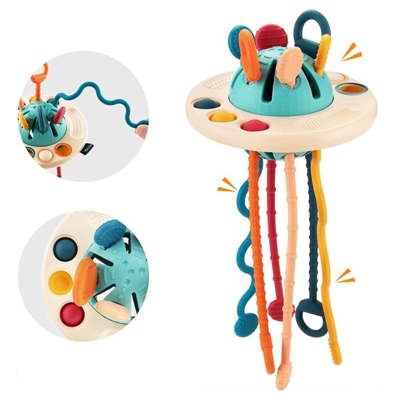 Jouet sensoriel OVNI en silicone au repos, forme ronde