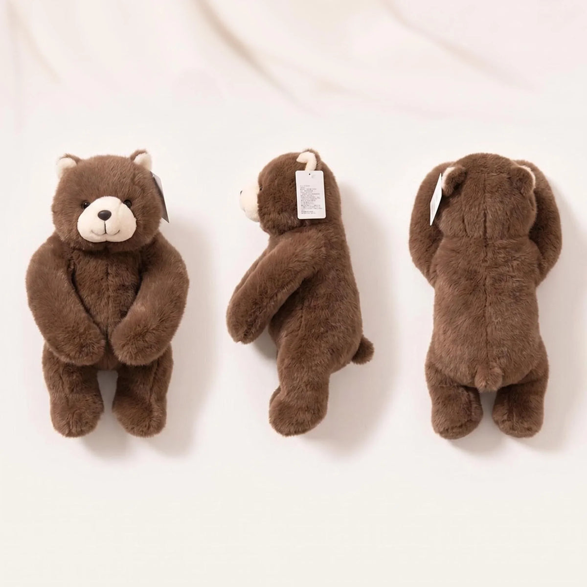 Peluche ours brun lestée 65 cm aux grands bras, vues de face, de profil et de dos