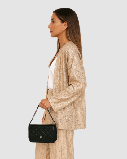 Ensemble pailleté femme or, blazer long et pantalon large vus de profil