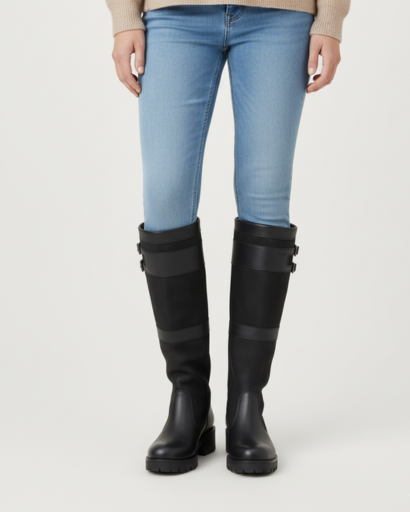 Bottes hautes équestres femme noires portées avec un jean, vue de face
