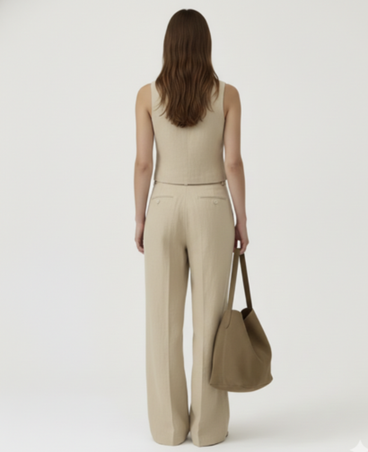 Ensemble tailleur femme avec gilet sans manches et pantalon large taille haute à plis