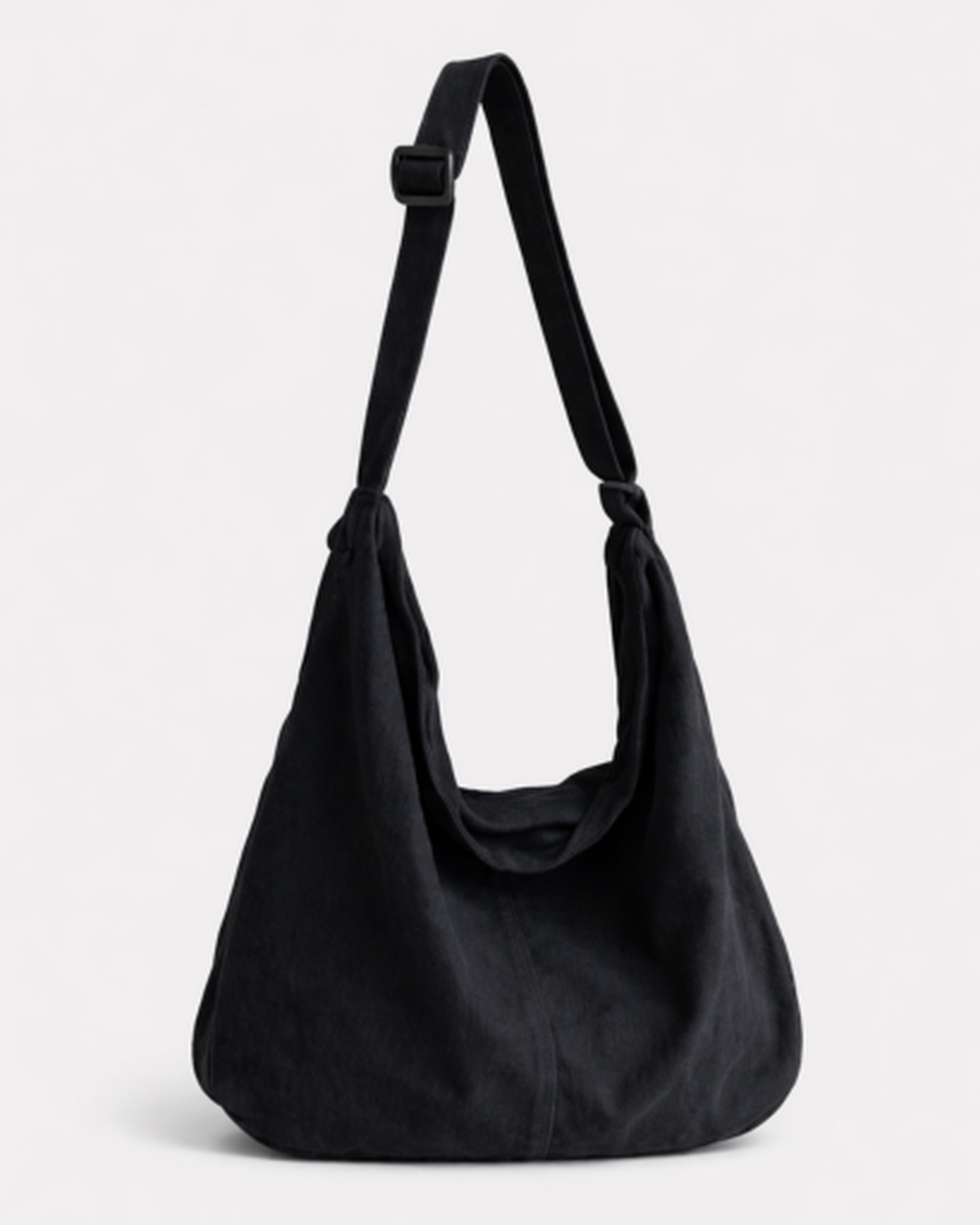 Sac hobo femme en cuir souple, bandoulière réglable, détail finition