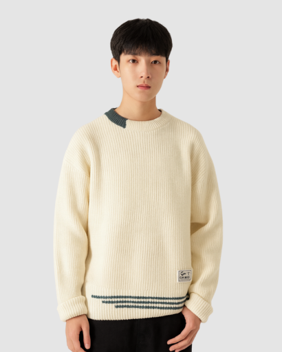Pull oversize homme en maille grise, vue de face
