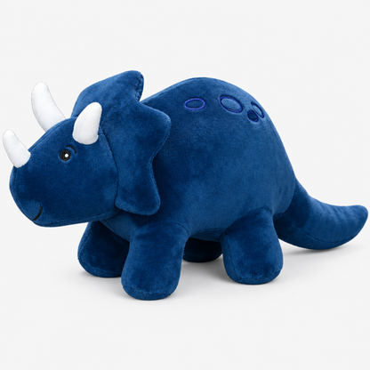 Peluche dinosaure tricératops bleu sur fond blanc studio