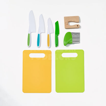Tablier et ustensiles à taille enfant du set de petit chef