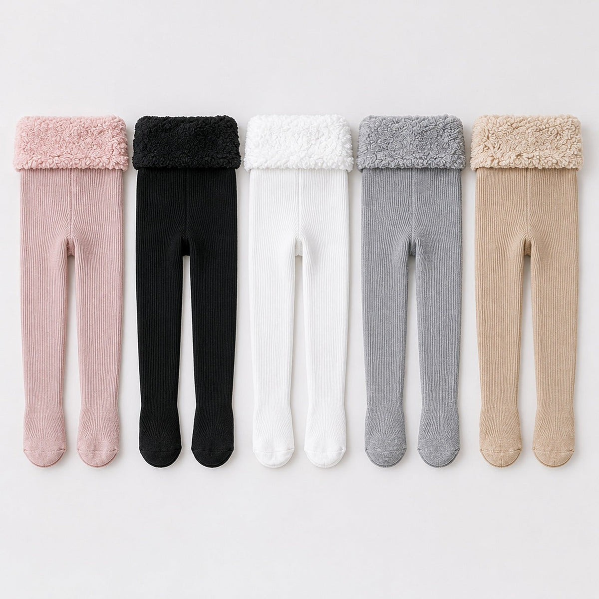 Les 5 coloris des collants thermiques enfant côtelés à plat : rose, noir, blanc, gris et camel
