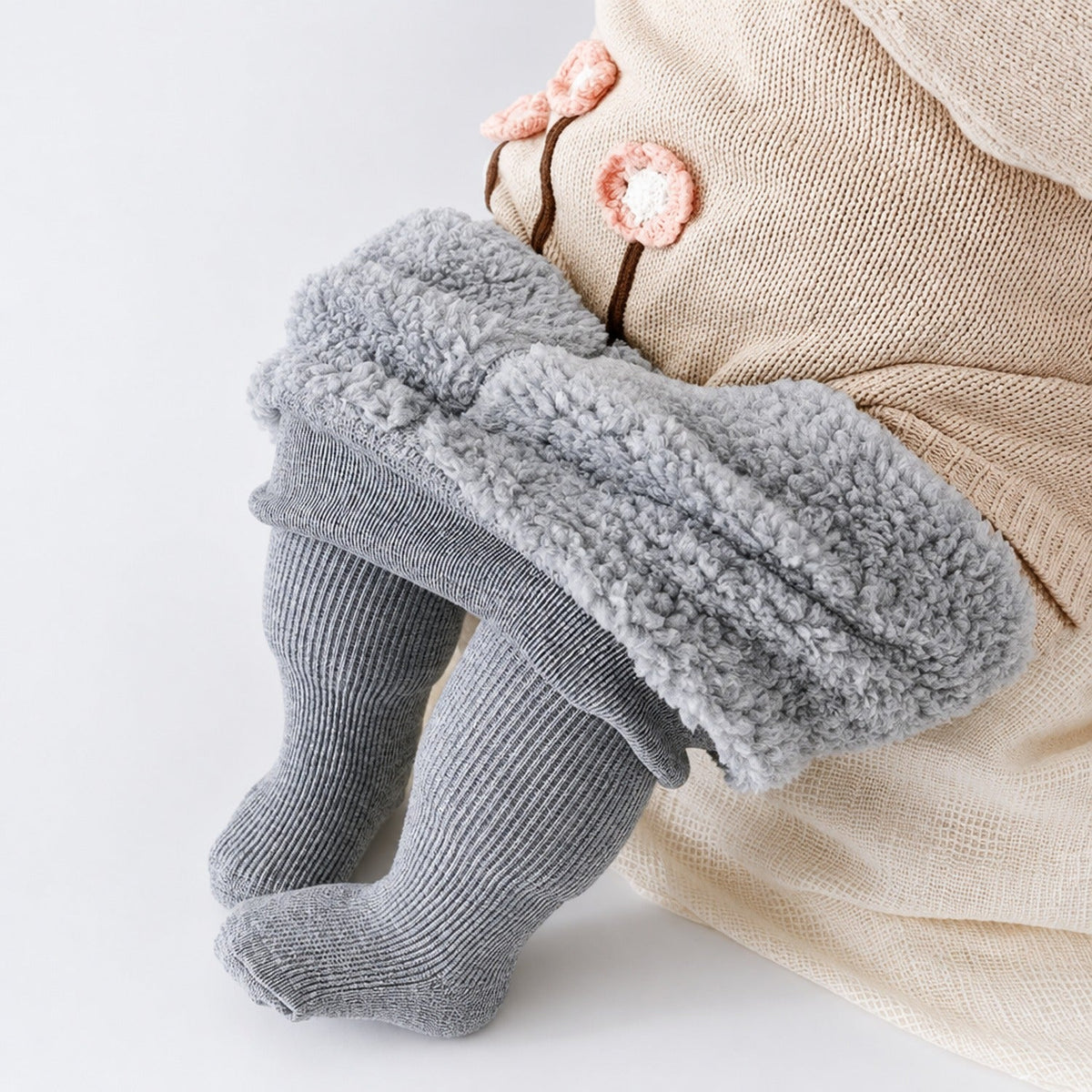 Collants thermiques enfant côtelés gris doublés polaire avec pieds intégrés, vue de face à plat