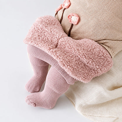 Collants thermiques enfant côtelés rose doublés polaire avec pieds intégrés, vue de face à plat