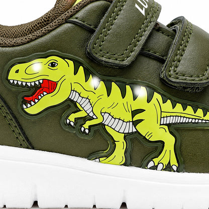 Gros plan sur l'imprimé dinosaure T-Rex sur le côté de la basket enfant lumineuse LED vert kaki
