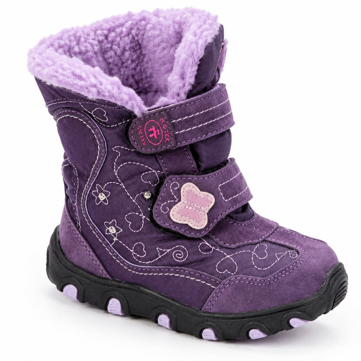 Gros plan sur la doublure en peluche douce à l'intérieur des bottes de neige violettes pour enfant