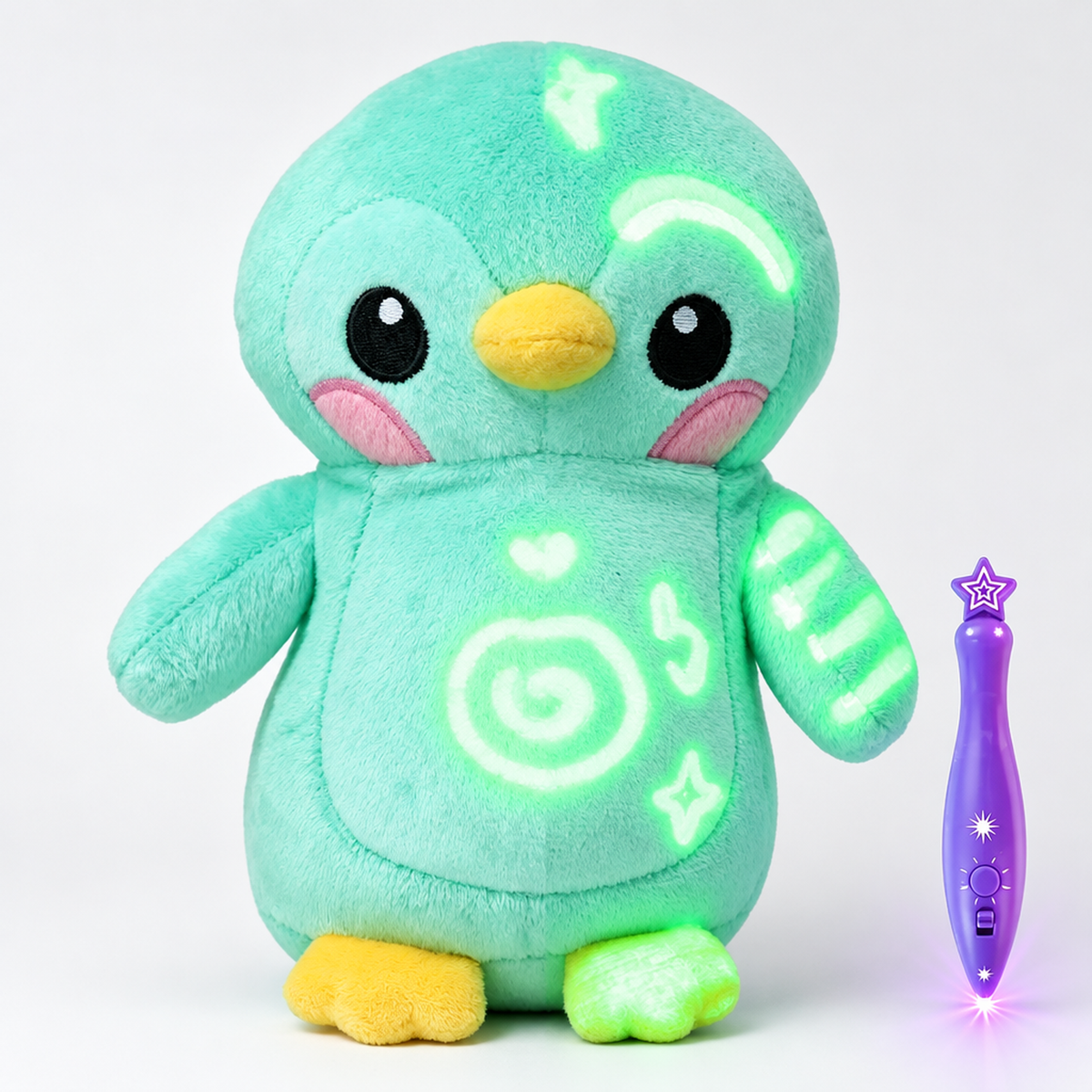 Peluche pingouin vert clair à dessiner phosphorescente avec stylo lumineux, vue de jour à côté de la vue phosphorescente de nuit