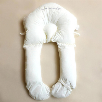 Coussin de soutien bébé installé dans une nurserie