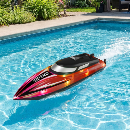 Bateau RC rouge naviguant sur une piscine