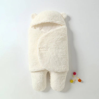 Détail du tissu peluche doux de la gigoteuse bébé