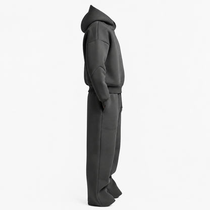 Survêtement homme oversize anthracite de profil, capuche et jogging jambe large
