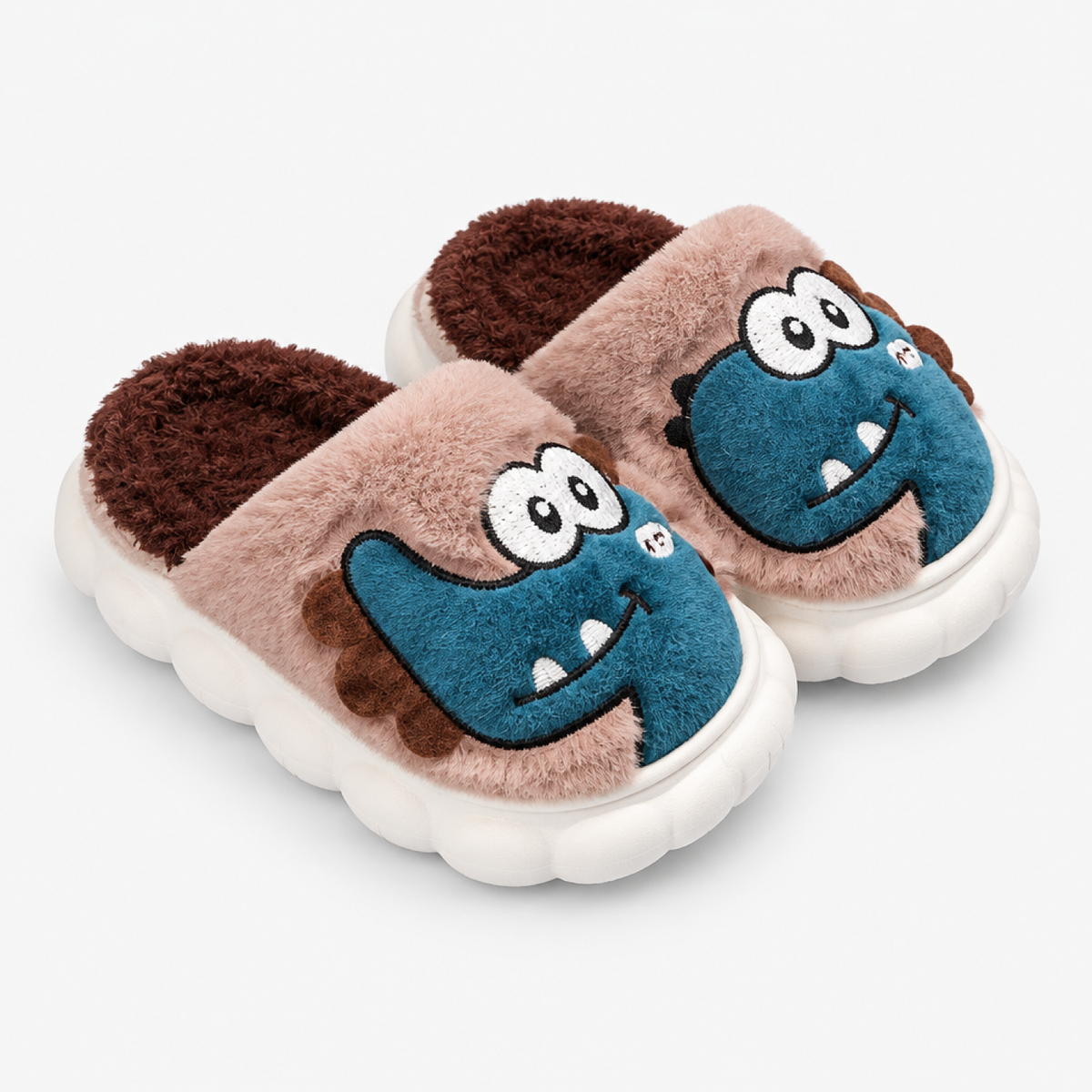 Chausson monstre marron en peluche, vue de côté montrant la semelle et la doublure moelleuse