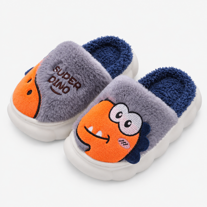 Chausson monstre gris en peluche, vue de côté montrant la semelle et la doublure moelleuse