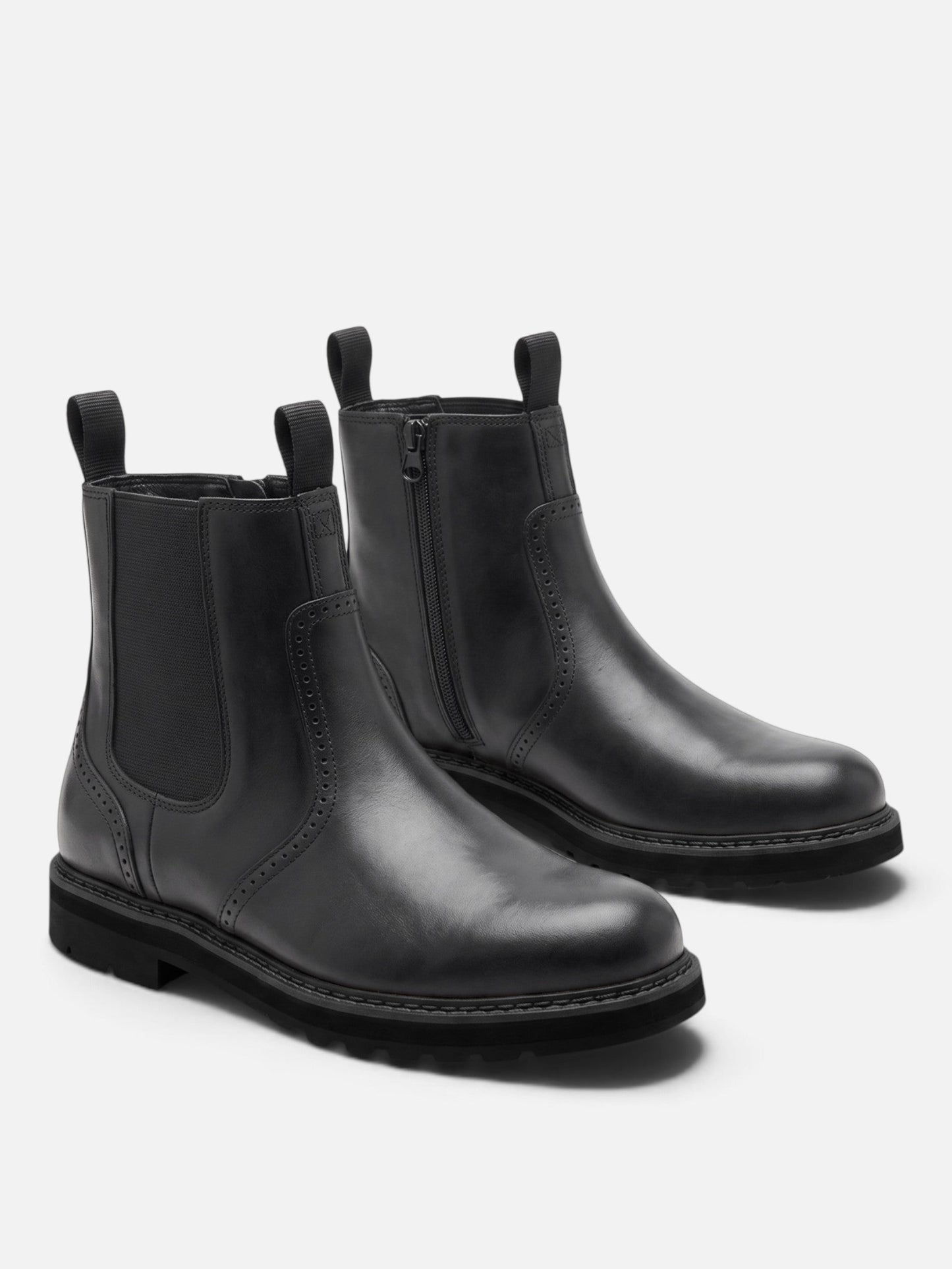 Bottines Chelsea homme noires, aspect cuir et daim, vue de côté