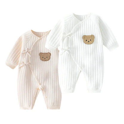 Détail des boutons pression du body bébé Ourson
