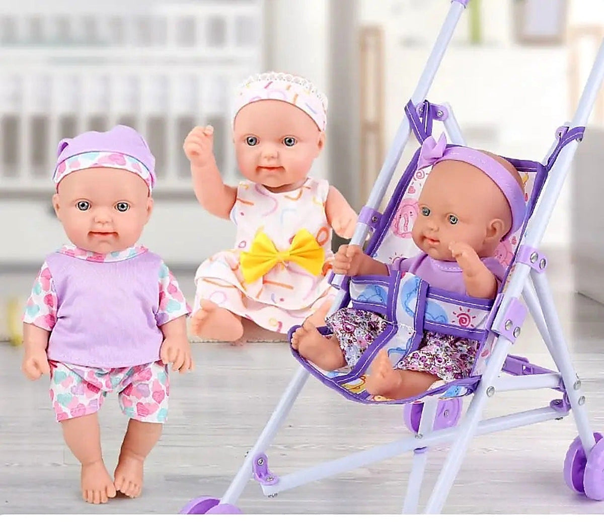 Landau pour poupées violet avec 3 poupons inclus