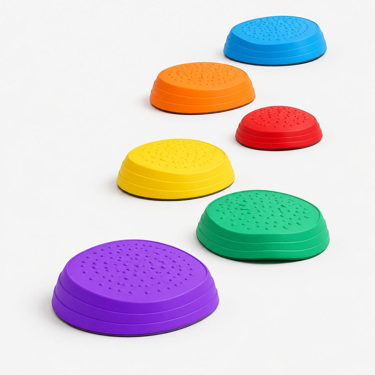 Plots d'équilibre colorés pour enfants disposés en parcours sinueux, 6 pierres texturées antidérapantes